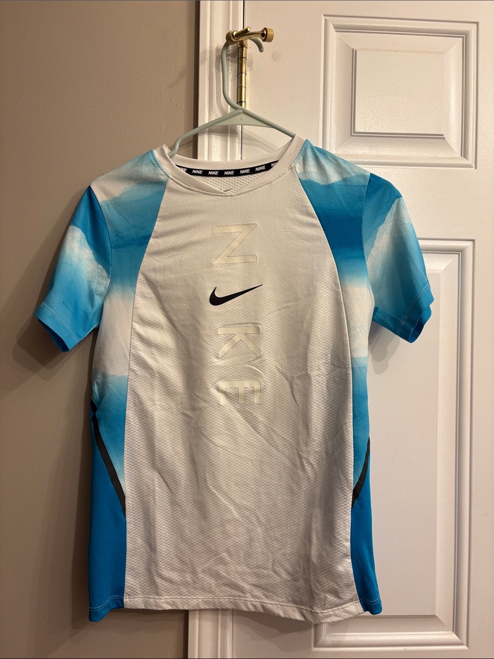 Nike Boy’s White and Blue sports top